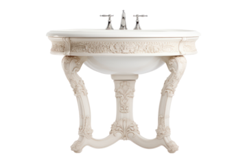 A classic, elegant bathroom sink with a pedestal base and intricate detailing. Isolated on white background.