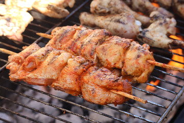 meat on the grill. Chicken kebabs or skewers on a braai. 