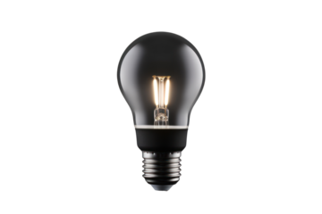 A bright, energy-efficient LED light bulb illuminating a dark room, isolated on a white background