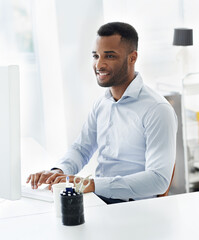Black man, computer and programming software at desk, online and design website on office internet....