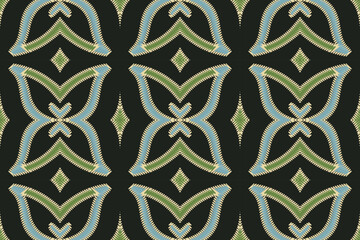 Ethnic ikat design Aztec tribal african art. Seamless pattern in tribal, folk embroidery, and Mexican style. Geometric ornament. Design for print fabric carpet