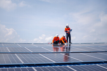 Engineer team installs solar cells  check installation solar cell on the roof  Sustainable energy industry concept Renewable energy solutions for climate change