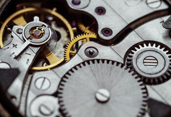 Clockwork old mechanical pocket watch. Macro shot.