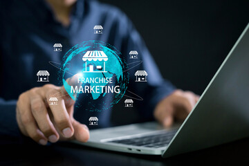 Franchise marketing concept. Businessman hand touching inscription Franchise marketing system , Franchise business or marketing expansion for growth.