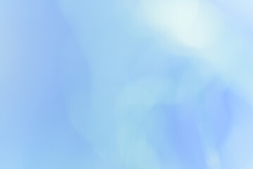 青い背景　光線　輝き　抽象的な背景素材
