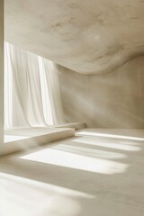 A minimalist empty stage with a white floor and backdrop, with gentle lighting creating soft shadows