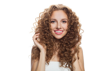 Pretty young adult woman with fresh skin and wavy long healthy hairstyle isolated on white background