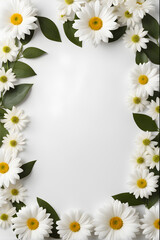 Fototapeta premium Frame made of white daisies and green leaves on white background