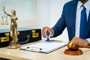 A male Asian lawyer in a formal suit handles contracts, agreements, legal obligations, and...