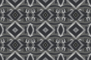 Ethnic abstract ikat art. Seamless pattern in tribal, folk embroidery, and Mexican style. Aztec geometric art ornament print.Design for carpet, wallpaper