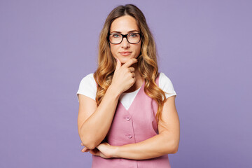 Young smart confident successful employee business woman corporate lawyer she wears white t-shirt vest glasses look camera prop up chin isolated on plain purple background. Achievement career concept.