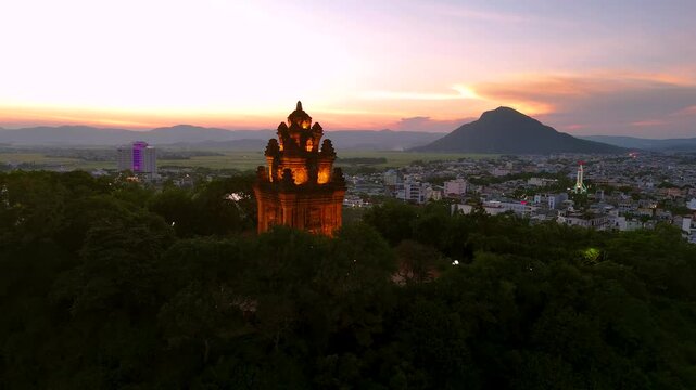 Aerial view of Nhan temple, tower is an artistic architectural work of Champa people in Tuy Hoa city, Phu Yen province, Vietnam. Sunset view. Travel and landscape concept