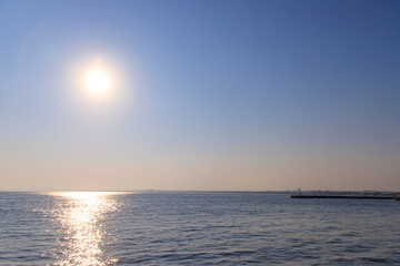 Fototapeta premium Serene Sunset Over the Waters of Enoshima, Japan