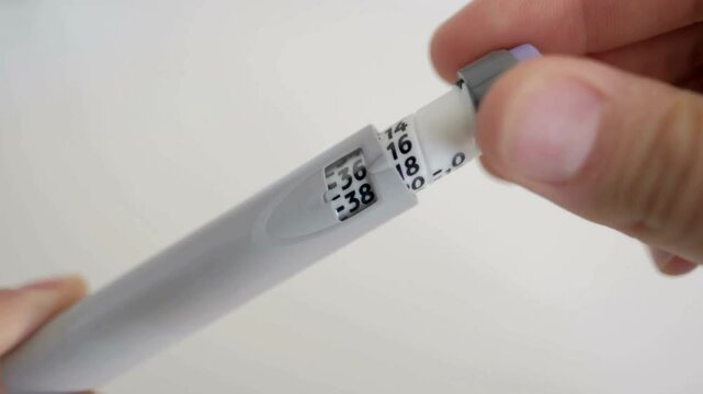 Detailed 4K Video of a Man Administering Insulin Pen Injection
