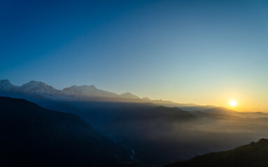 sunrise over the mountains in Lamjung Nepal.