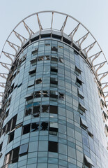 Destroyed business center after ballistic missile attack, Kyiv, Ukraine. Broken windows on building facade after explosion. Russian aggression in Ukraine. War in Ukraine. Damage after missile attack