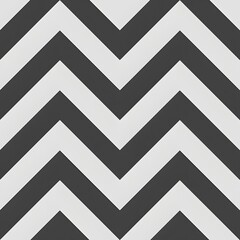 A black and white chevron patterned background with a white letter M in the middle. The chevron pattern is bold and striking, while the white letter M adds a sense of elegance