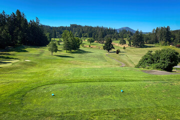 Scenic view of Laurelwood Golf Course in Eugene, Oregon, USA against blue sky