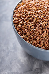 Bowl with Raw Uncoocked Buckwheat, Close Up