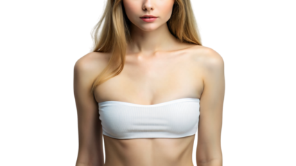 A woman posing in white lingerie in a studio, flat breast