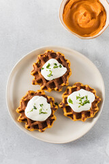 Vegetarian sweet potato waffles with natural yogurt. Healthy breakfast.