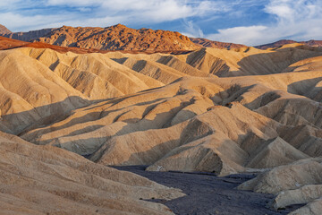 Landscape at sunsett from Zabriskie Point of Golden Canyon, Death Valley National Park, California, USA