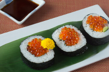Makizushi, also known as “norimaki,” refers to a type of sushi where rice and ingredients are carefully rolled in a sheet of nori seaweed.