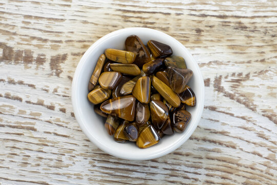 Natural mineral gem stone Tiger's eye Tigers eye, Tiger eye gemstone as nice background close up