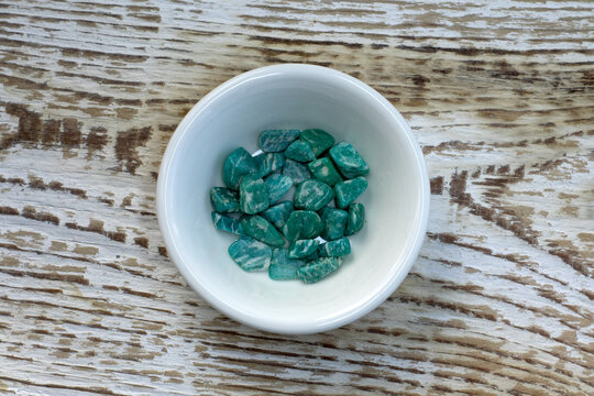 Amazonite also known as amazonstone Semi-Precious Gemstones on white textured background