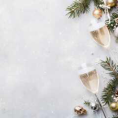 festive happy new year set on white background with a lot of free space for text, flat lay, champagne glasses and winter decor, design template for merry christmas greeting card, poster, banner