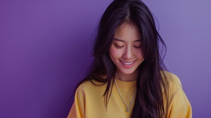 Fototapeta premium Smiling Woman Against a Purple Background