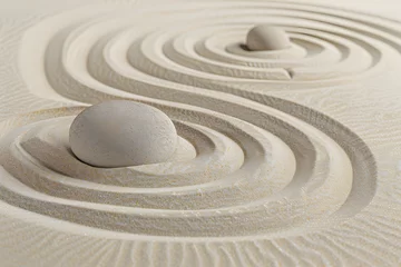 Papier peint photo Beige Zen sand garden meditation stone background with copy space. Stones and lines drawing in sand for relaxation. Concept of harmony, balance and meditation, spa, massage, relax. Set Sail Champagne color  © john