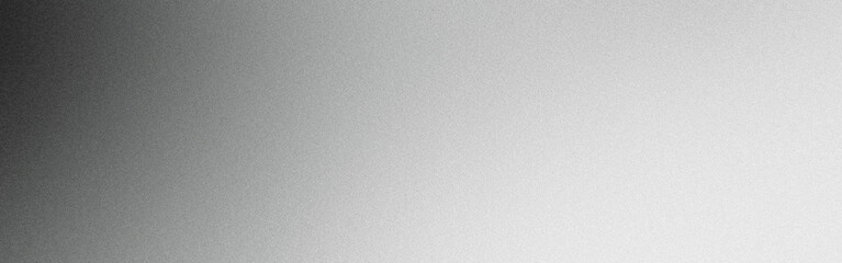 Subtle grain texture on a black and white gradient background