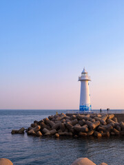 Twilight view of haeundae beach lighthouse in Busan, South Korea