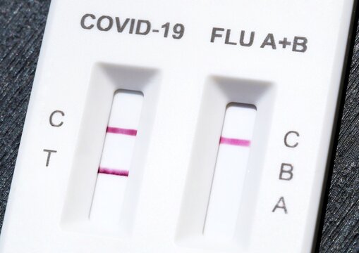 Triple multi-disease antigen test capable of detecting Covid-19, influenza A, and influenza B. This rapid test indicates a positive result for coronavirus