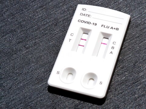 Triple multi-disease antigen test capable of detecting Covid-19, influenza A, and influenza B. This rapid test indicates a positive result for coronavirus