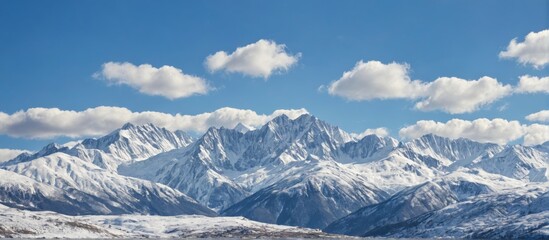Naklejka premium landscape photograph mountain range sky blue few white