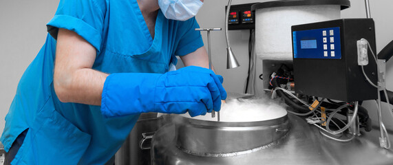 Embryologists a Liquid Nitrogen Bank Containing Sperm and Eggs Samples. ivf in vitro fertilization,...