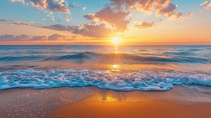 Obraz premium A stunning sunset over ocean waves, with the sun casting a warm glow on the water and sky, creating a picturesque scene.