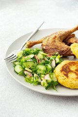 Chickpea cutlets with mixed salad with cucumbers and radishes, baked farm chicken legs, a delicious hearty lunch or dinner