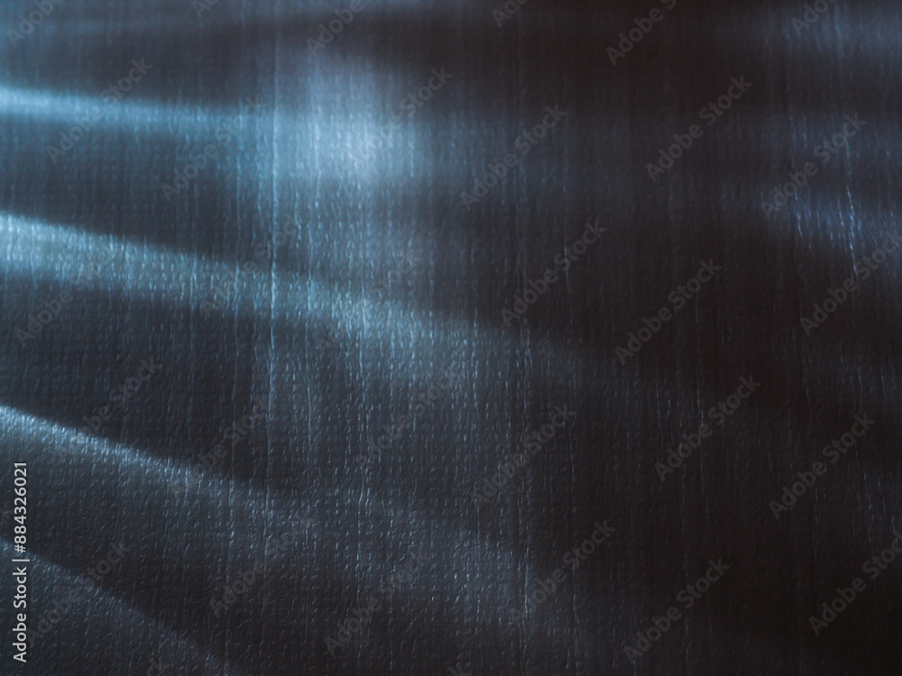 Wall mural light reflections on foam sheets in the dark for an energy abstract background.
