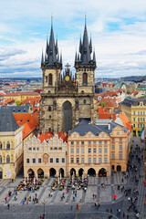 Fototapeta premium Mother of God before Tyn Church during a popular festival, Old Town Square, Prague, Bohemia, Czech Republic
