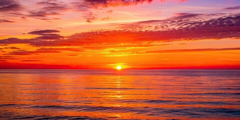 Fototapeta premium Beautiful sunset casting a orange and pink hue over the calm ocean , sunset, ocean, sky, horizon, water, tranquil, colorful