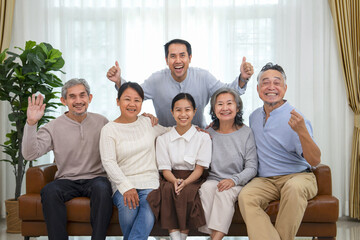 portrait of happy 3rd generations asian families in the living room at home,family lifestyle,relationship,the love of a family