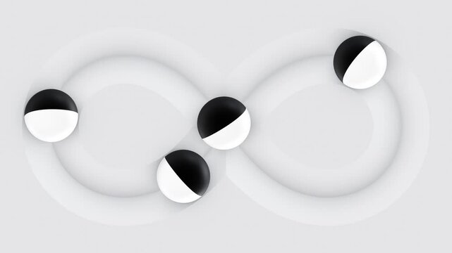 Black and white spheres rotate in infinity loop animation