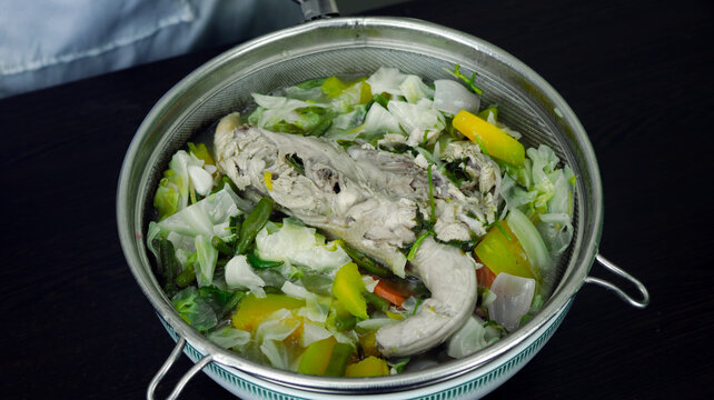 Traditional Thai Soup with Fresh Herbs and Spices in Authentic Bowl