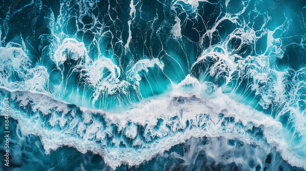 Poster aerial view of powerful ocean waves crashing into each other, creating dramatic white foam.