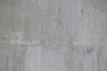 Gray concrete wall with rough texture