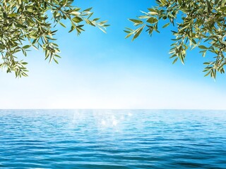 Tranquil ocean view framed by green leaves on a sunny day