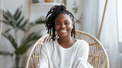 Fototapeta premium happy young african american young woman sitting in her chair smiling. AI Generative
